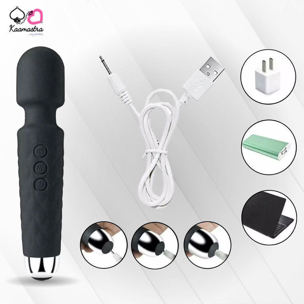 Black handheld electronic device with USB cable and charging adapter on a white background
