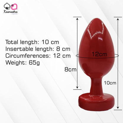 A collection of anal butt plugs in various colors, each featuring a crystal jewel at the base. The plugs are designed in a smooth, egg-shaped form.